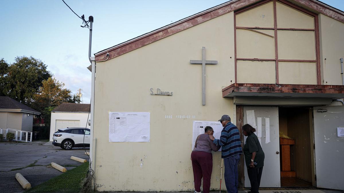 People arrive to vote at a polling station at St. David's Baptist Church in the 9th Ward area of New Orleans, Louisiana, on Election Day, Nov. 5, 2024. (Sandy Huffaker/AFP/Getty Images/TNS)