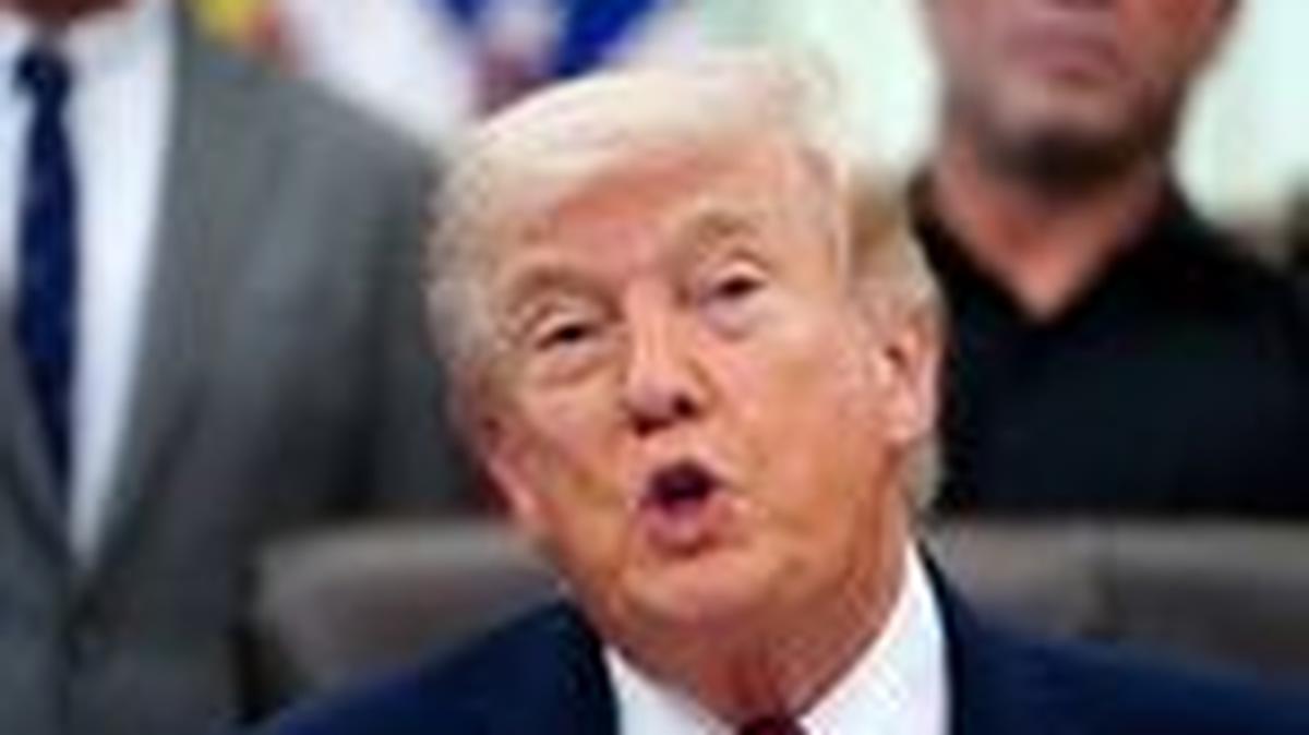 FILE PHOTO: U.S. President Donald Trump speaks about research into mental health treatments in the Oval Office of the White House in Washington, D.C., April 18, 2026. REUTERS/Nathan Howard/File Photo