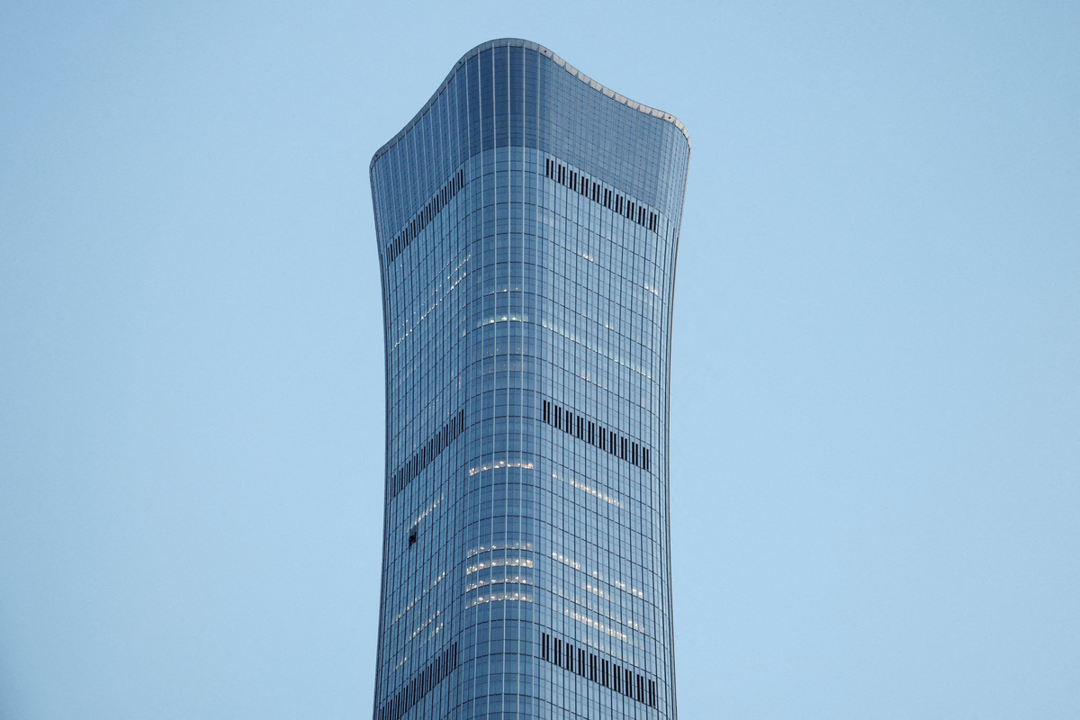 FILE PHOTO: The CITIC Tower, also known as China Zun, where damage is visible on a high floor of the exterior, in Beijing, China June 26, 2026. REUTERS/Maxim Shemetov/File Photo