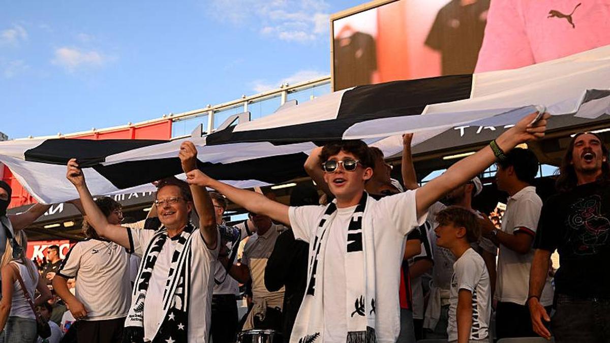  New Zealand fans love to dress in white. | Joe Allison/FIFA/Getty Images 