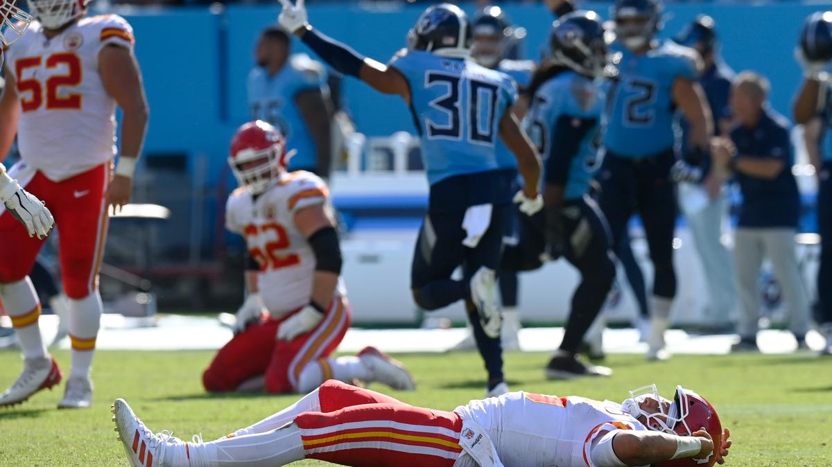 Kansas City Chiefs quarterback Patrick Mahomes lies on the field after being hit in the second half of an NFL football game against the Tennessee Titans Sunday, Oct. 24, 2021, in Nashville, Tenn. (AP Photo/Mark Zaleski)