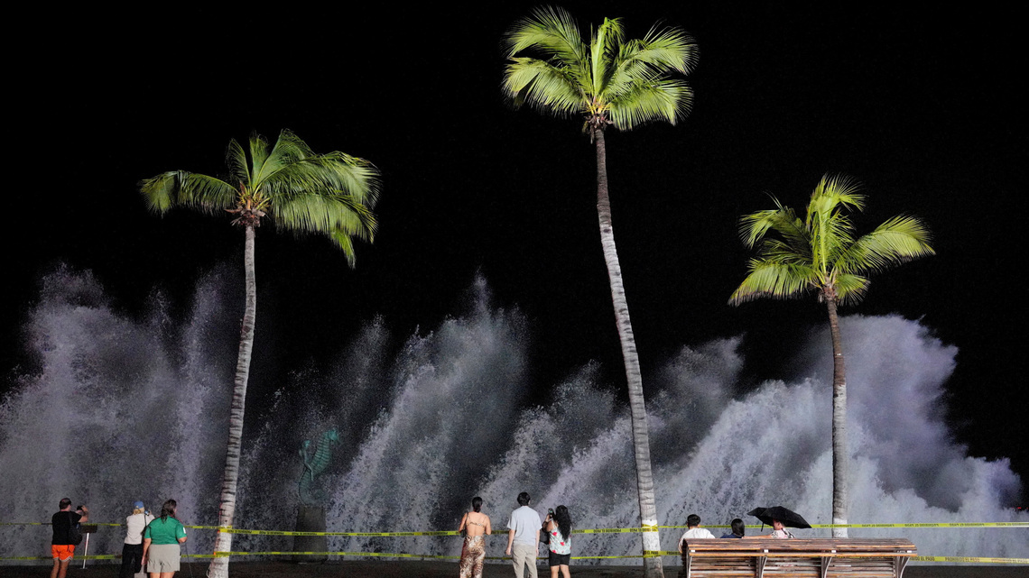 Hurricane Simon crawls along Mexico's Pacific coast, bringing floods and evacuations 