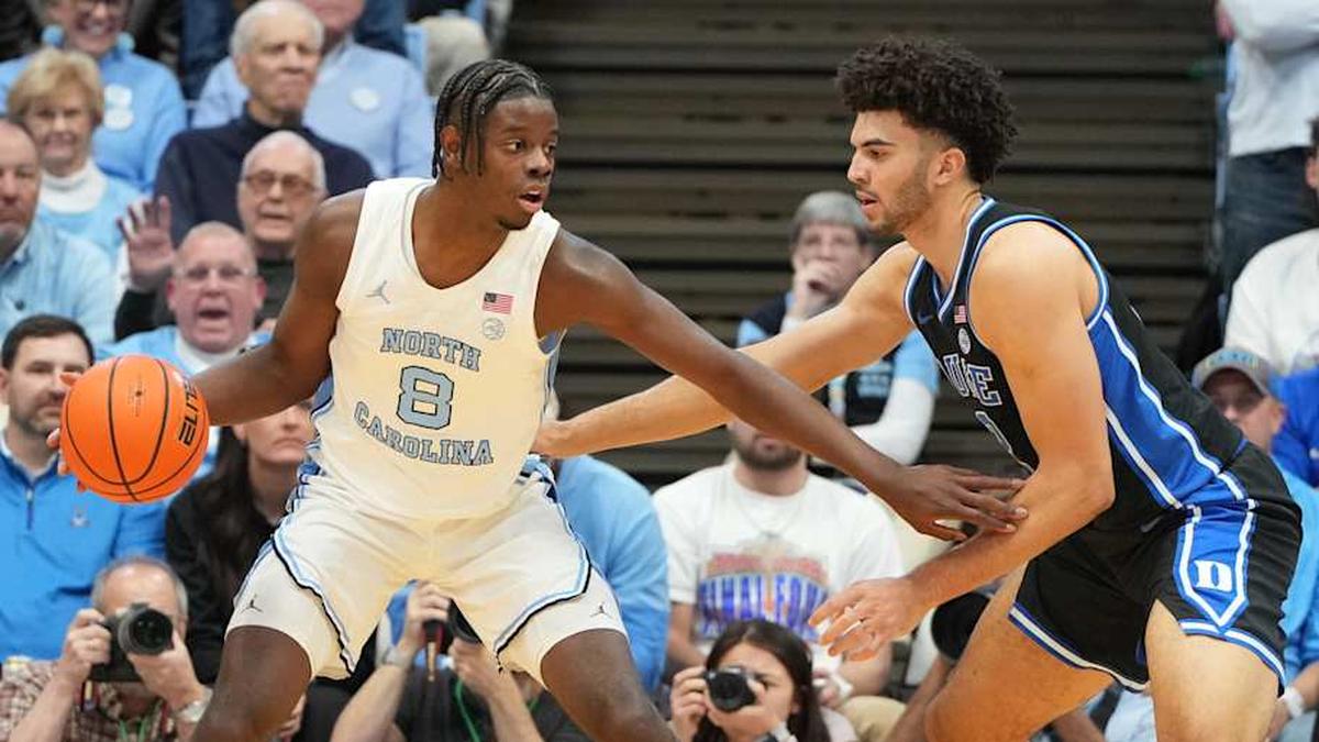  North Carolina forward Caleb Wilson drives with the ball against Duke forward Cameron Boozer last season. | Bob Donnan-Imagn Images 