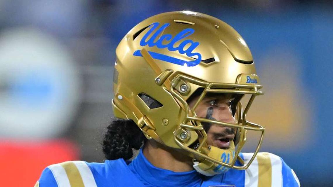  Nov 22, 2025; Pasadena, California, USA; UCLA Bruins quarterback Nico Iamaleava (9) sets to pass the ball during the first half against the Washington Huskies at the Rose Bowl. Mandatory Credit: Jayne Kamin-Oncea-Imagn Images | Jayne Kamin-Oncea-Imagn Images 