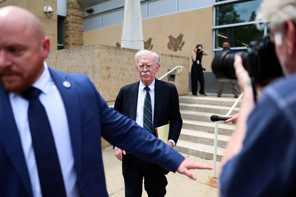 Former White House national security adviser John Bolton leaves the U.S. District Court for the District of Maryland, in Greenbelt, Maryland, U.S., June 26, 2026. REUTERS/Tom Brenner
