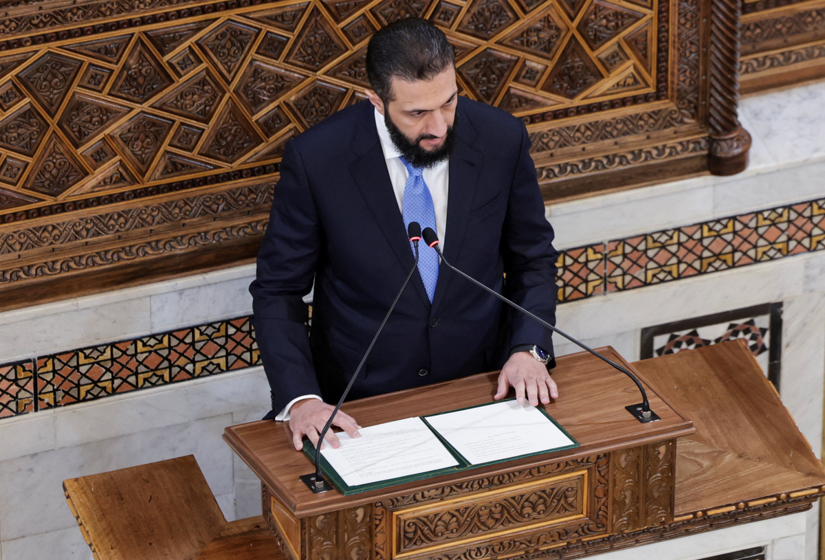 Syrian President Ahmed al-Sharaa speaks during the inaugural session of Syria's newly formed People's Assembly, the first parliament session since the end of the rule of ousted Syrian President Bashar al-Assad, in Damascus, Syria, July 12, 2026. REUTERS/Khalil Ashawi