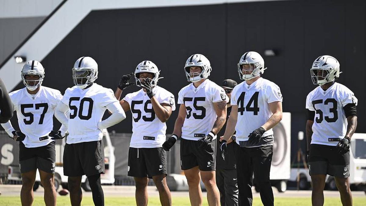  May 20, 2026; Henderson, NV, USA; Las Vegas Raiders linebacker Cameron McGrone (57), linebacker Segun Olubi (50), linebacker Chris Thomas (59), linebacker Cody Lindenberg (55), linebacker Tommy Eichenberg (44) and linebacker Xavian Sorey Jr. (53) practice during organized team activities at Intermountain Health Performance Center. Mandatory Credit: Candice Ward-Imagn Images | Candice Ward-Imagn Images 