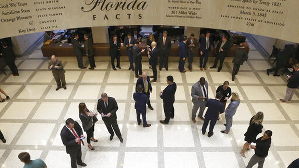 Lobbyists start to fill the fourth floor gallery between the House and Senate chambers as session starts to consider the budget Tuesday March 10, 2020, at the Florida Capitol, in Tallahassee, Fla.