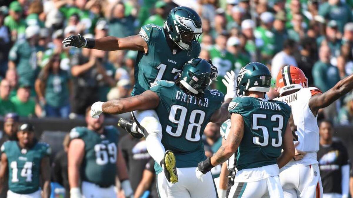  Oct 13, 2024; Philadelphia, Pennsylvania, USA; Philadelphia Eagles defensive tackle Jalen Carter (98) celebrates his sack with linebacker Nakobe Dean (17) against the Cleveland Browns during the second quarter at Lincoln Financial Field. Mandatory Credit: Eric Hartline-Imagn Images | Eric Hartline-Imagn Images 