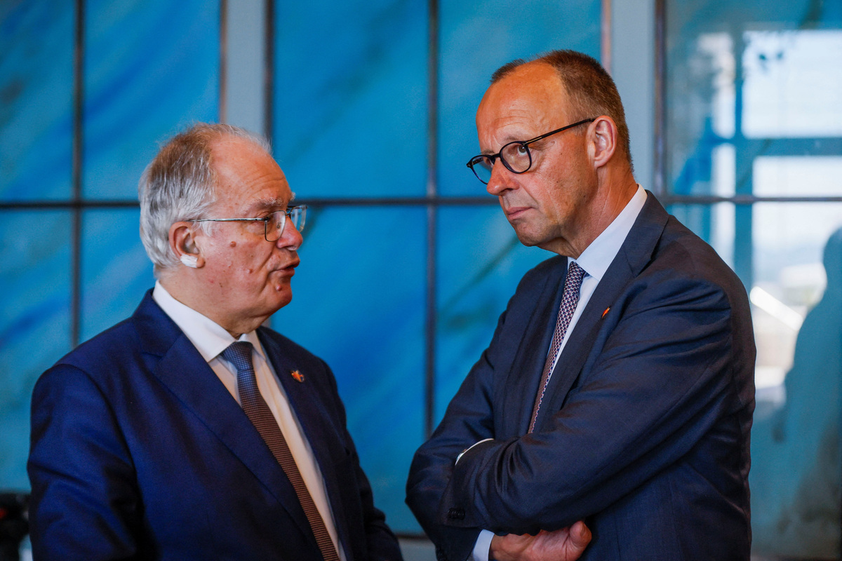 Greek President Constantine Tassoulas talks with German Chancellor Friedrich Merz on the day of a plenary session at the EU-Western Balkans Summit in Tivat, Montenegro, June 5, 2026. REUTERS/Stevo Vasiljevic