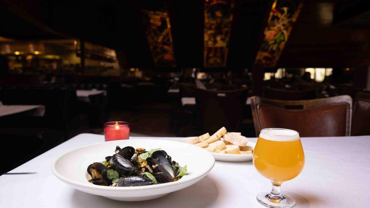Serve mussels in a large bowl with crusty bread.