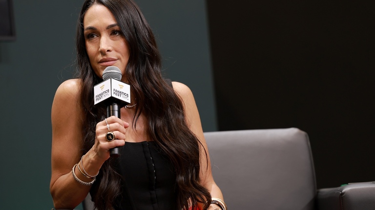 Brie Bella Was Hospitalized After Pooping Too Much, Including in Ambulance 
