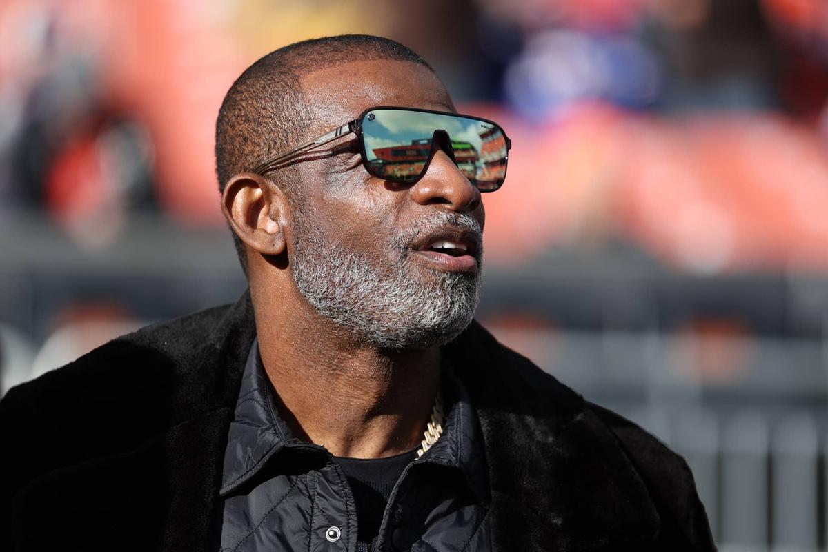  Dec 21, 2025; Cleveland, Ohio, USA; Legendary football and baseball player and father of Cleveland Browns quarterback Shedeur Sanders, Deion Sanders on the sidelines prior to a game against the Buffalo Bills at Huntington Bank Field. Mandatory Credit: Scott Galvin-Imagn Images 