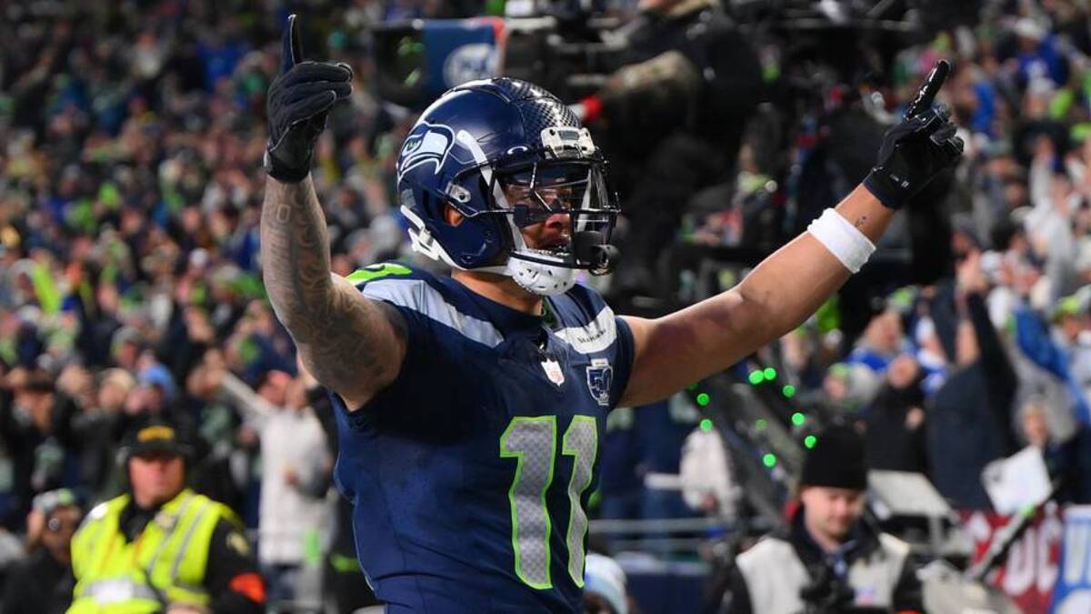  Seattle Seahawks wide receiver Jaxon Smith-Njigba (11) celebrates after scoring a touchdown against the Los Angeles Rams during the first half in the 2026 NFC Championship Game at Lumen Field. | Steven Bisig-Imagn Images 
