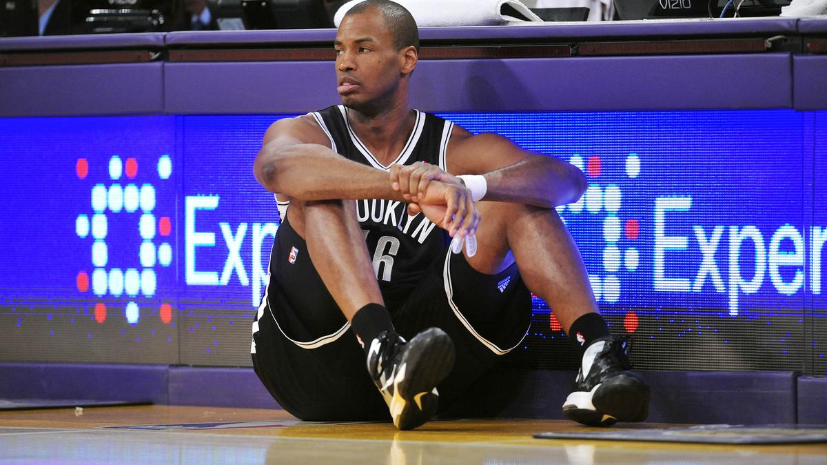 February 23, 2014; Los Angeles, CA, USA; Brooklyn Nets center Jason Collins (46) waits to enter the game against the Los Angeles Lakers during the second half at Staples Center. Mandatory Credit: Gary A. Vasquez-USA TODAY Sports
