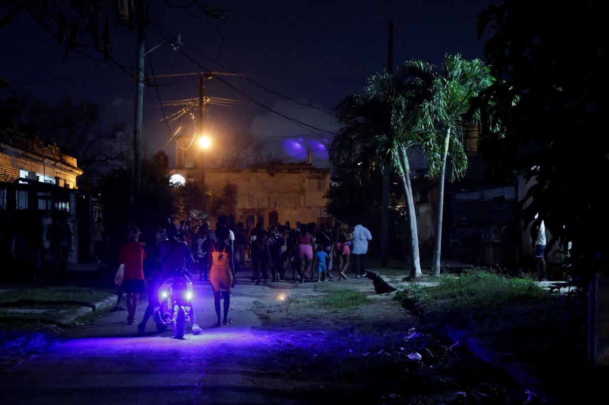 People protest against frequent power cuts as the capital Havana faces its worst rolling blackouts in decades amid a U.S. blockade that has strangled the island of fuel, in Havana, Cuba, May 13, 2026. REUTERS/Norlys Perez