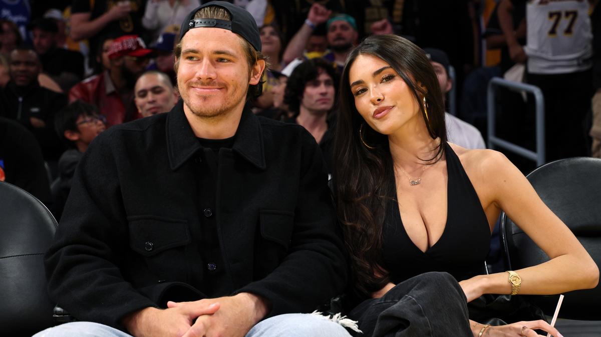 LOS ANGELES, CALIFORNIA - OCTOBER 24: Quarterback Justin Herbert #10 of the Los Angeles Chargers and Madison Beer attend a basketball game between Los Angeles Lakers and Minnesota Timberwolves at Crypto.com Arena on October 24, 2025 in Los Angeles, California. NOTE TO USER: User expressly acknowledges and agrees that, by downloading and/or using this Photograph, user is consenting to the terms and conditions of the Getty Images License Agreement.(Photo by Kevork Djansezian/Getty Images)