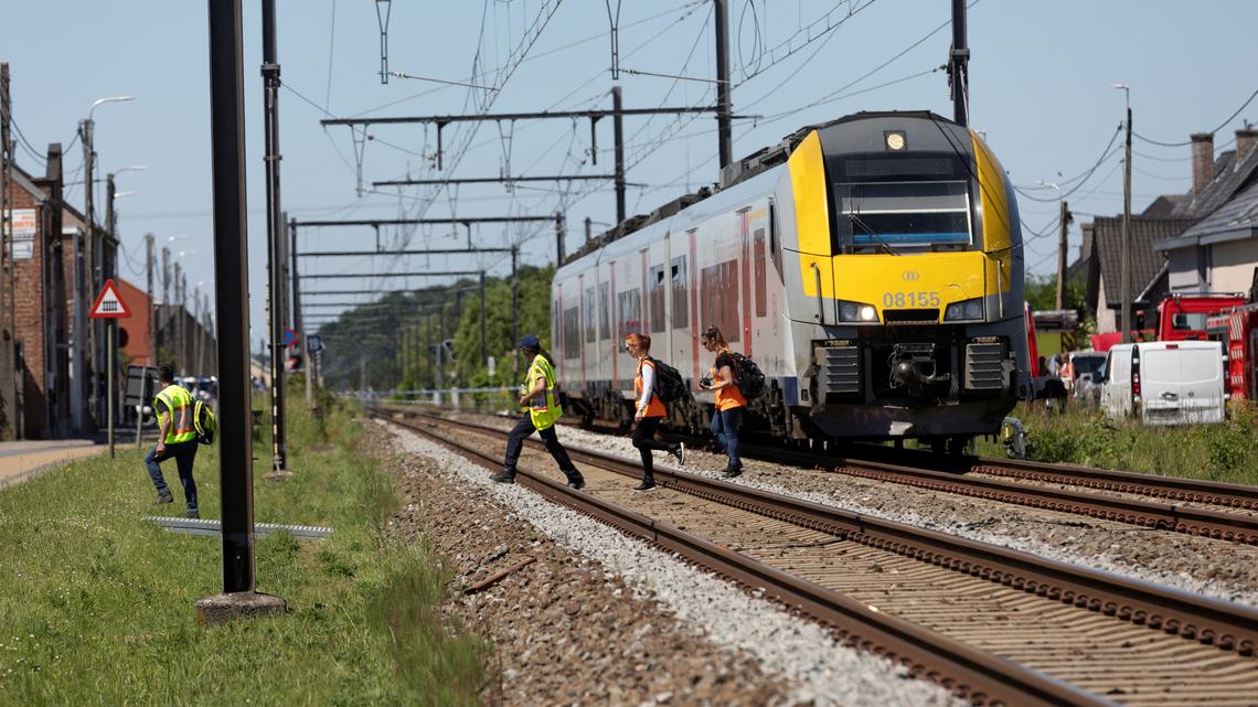 Train hits school minivan in Belgium, killing four including pupils 