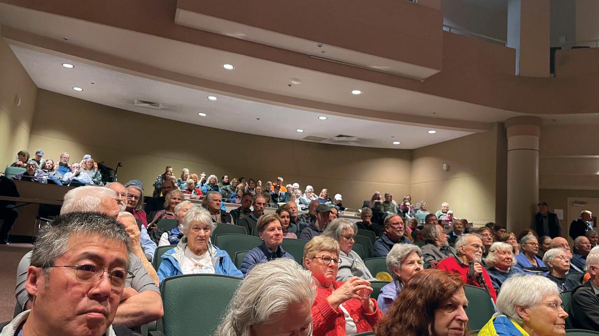 A packed auditorium watches 2026 U.S. House of Representatives candidates Matt Schultz, a Democrat, and Bill Hill, an independent, during a forum held at the Loussac Library in Anchorage, Alaska, on Saturday, May 9, 2026. (Margaret Carmel/Anchorage Daily News/TNS)