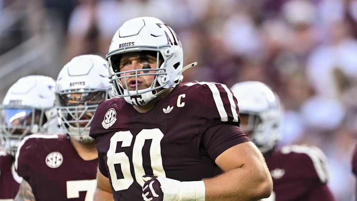 Oct 11, 2025; College Station, Texas, USA; Texas A&M Aggies offensive lineman Trey Zuhn III (60) and the offense runs onto the field in the first half against the Florida Gators at Kyle Field. Mandatory Credit: Maria Lysaker-Imagn Images | Maria Lysaker-Imagn Images 