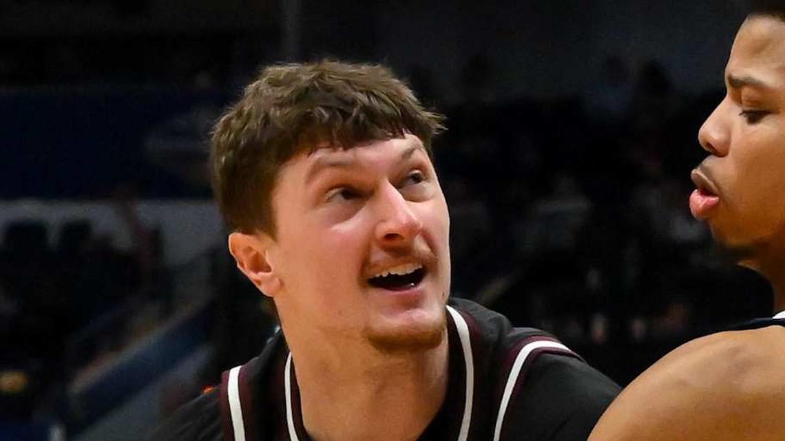  Mar 11, 2026; Nashville, TN, USA; Auburn Tigers guard Keyshawn Hall (7) strips the ball from Mississippi State Bulldogs forward Sergej Macura (11) during the second half at Bridgestone Arena. Mandatory Credit: Steve Roberts-Imagn Images | Steve Roberts-Imagn Images 