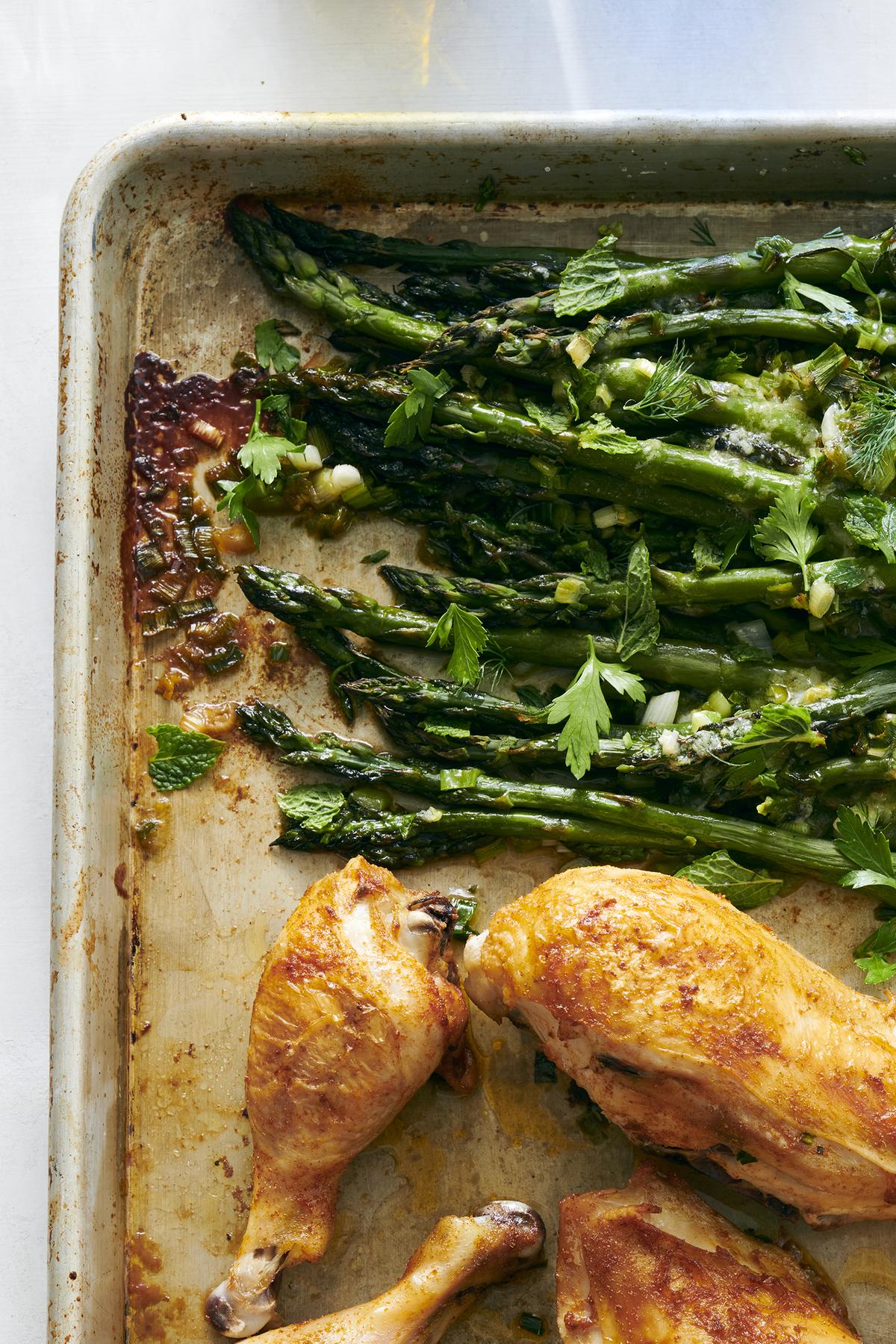 Lemon chicken with asparagus. A shower of herbs just before serving makes this one-pan dinner feel extra fresh. Food styled by Hadas Smirnoff. (David Malosh/The New York Times)