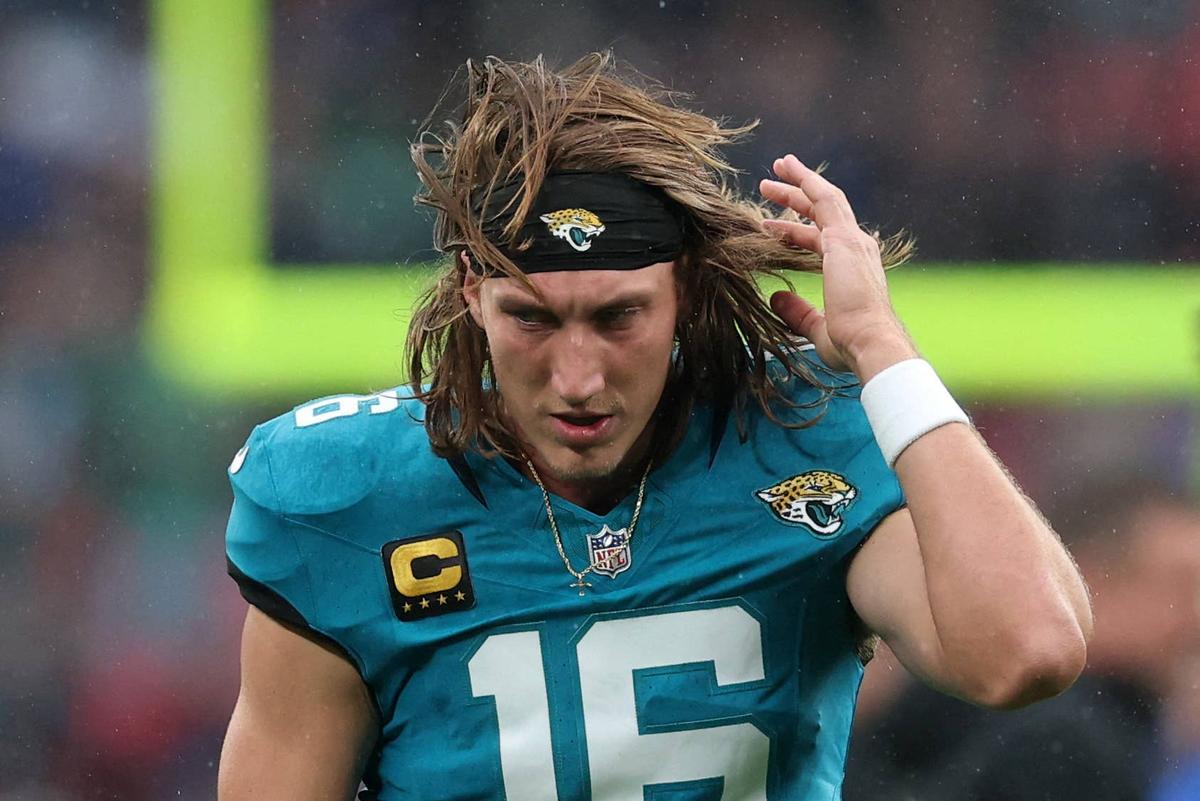  Oct 19, 2025; London, England; Jacksonville Jaguars quarterback Trevor Lawrence (16) warms up before the game between the Los Angeles Rams and the Jacksonville Jaguars at Wembley Stadium. Mandatory Credit: Andrew Boyers-Reuters via Imagn Images 