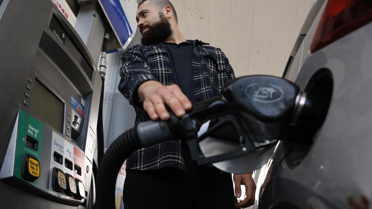 Gas Prices Surge As Ships Remain Stranded At Gulf Of Hormuz. A customer pumps gas into his car at a Chevron station on May 04, 2026 in Los Angeles, California. 