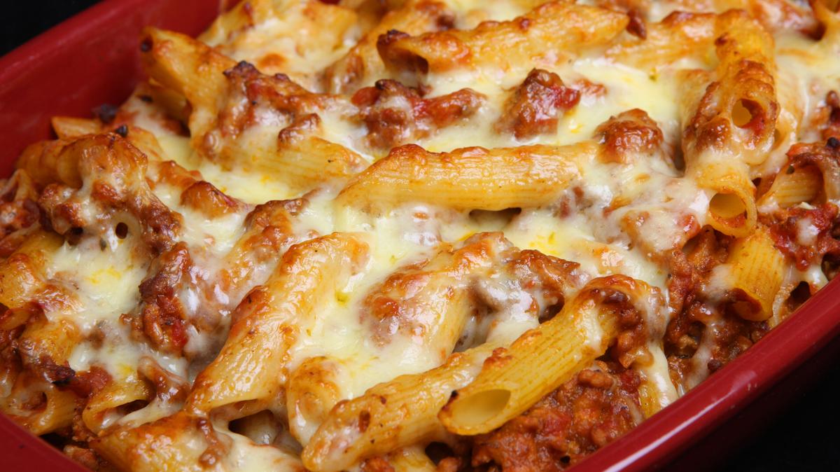 Baked rigatoni pasta with bolognese sauce and cheese