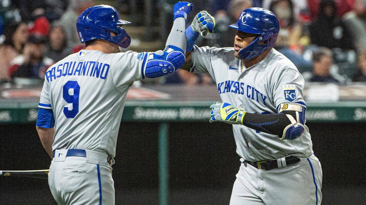 Kansas City Royals’ Vinnie Pasquantino congratulates Salvador Perez after his solo home run off Cleveland Guardians relief pitcher Kirk McCarty during the seventh inning in Cleveland on Oct. 1, 2022.