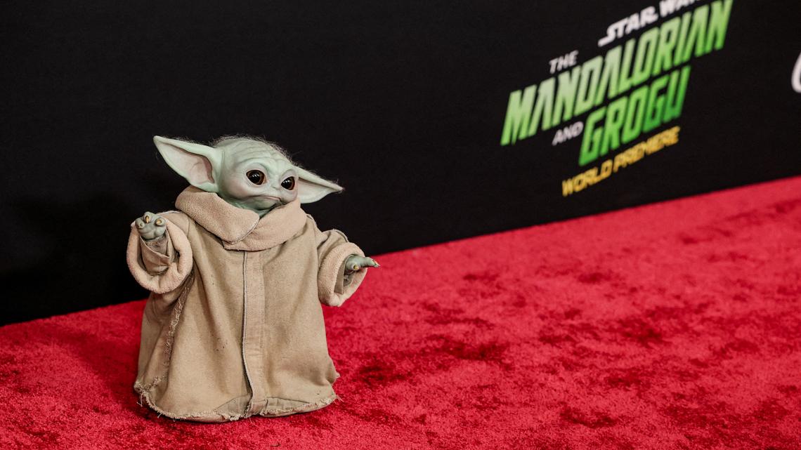 Baby Yoda re-sets 'Star Wars' films with $165 million global opening 