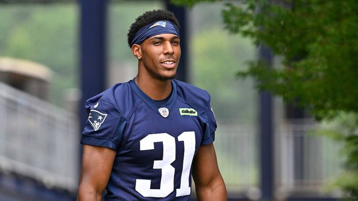  Jun 9, 2025; Foxborough, MA, USA; New England Patriots safety Craig Woodson (31) walks to the practice fields at Gillette Stadium. Mandatory Credit: Eric Canha-Imagn Images | IMAGN IMAGES via Reuters Connect 