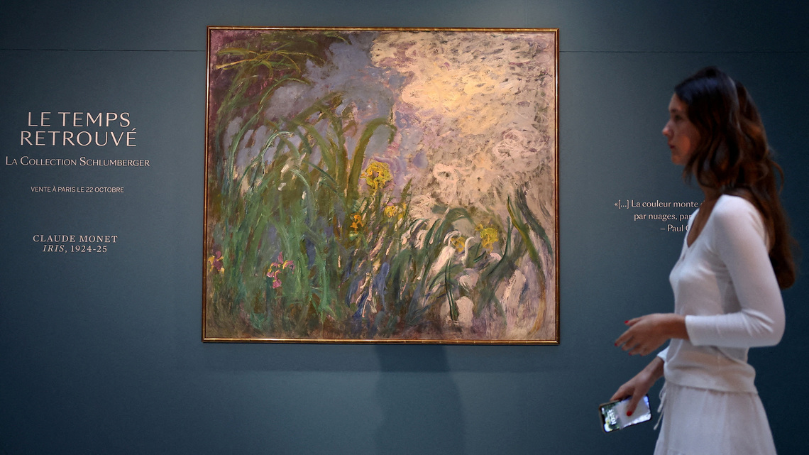 Claude Monet's 'Iris' becomes most expensive artwork sold at auction in France, Sotheby's says 