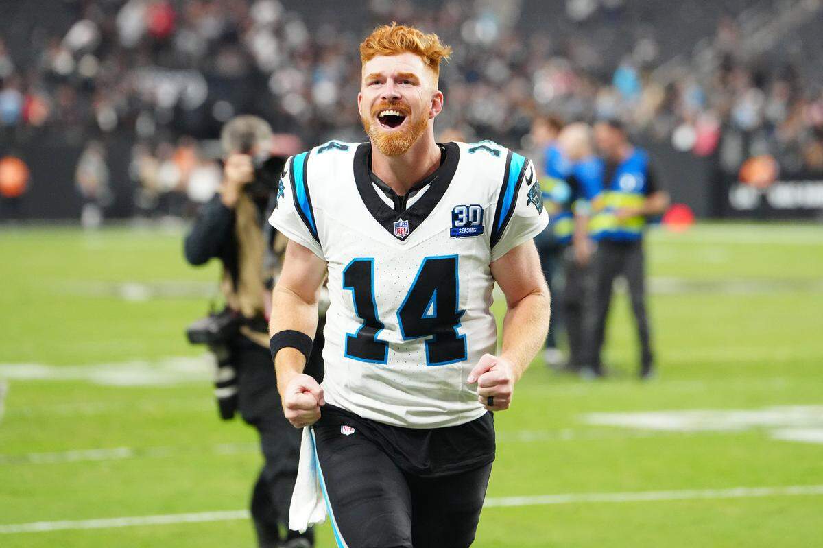 Sep 22, 2024; Paradise, Nevada, USA; Carolina Panthers quarterback Andy Dalton (14) celebrates after the Panthers defeated the Las Vegas Raiders at Allegiant Stadium.