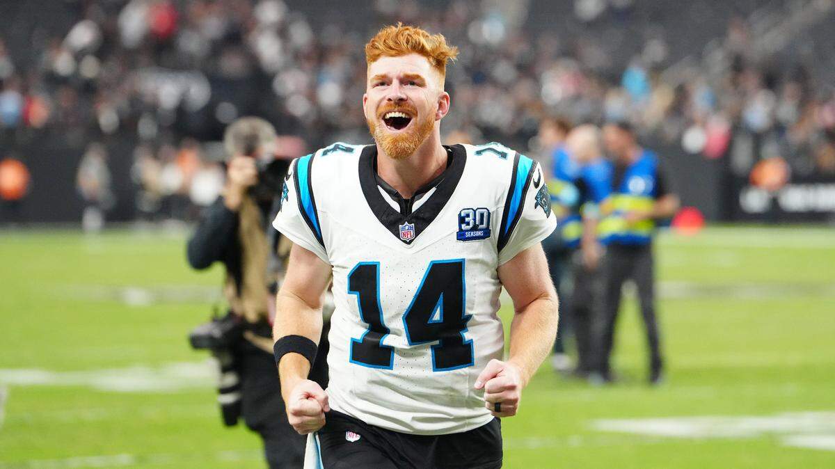 Carolina Panthers quarterback Andy Dalton (14) celebrates after the Panthers defeated the Las Vegas Raiders at Allegiant Stadium in Paradise, Nevada, on Sunday.