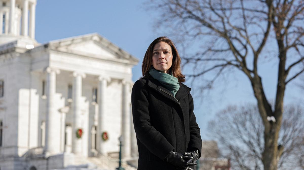 Rebecca Bennett, a former U.S. Navy helicopter pilot who is running to represent New Jersey’s 7th Congressional District, poses for a photograph in Somerville, New Jersey, U.S., December 16, 2025. REUTERS/Jeenah Moon