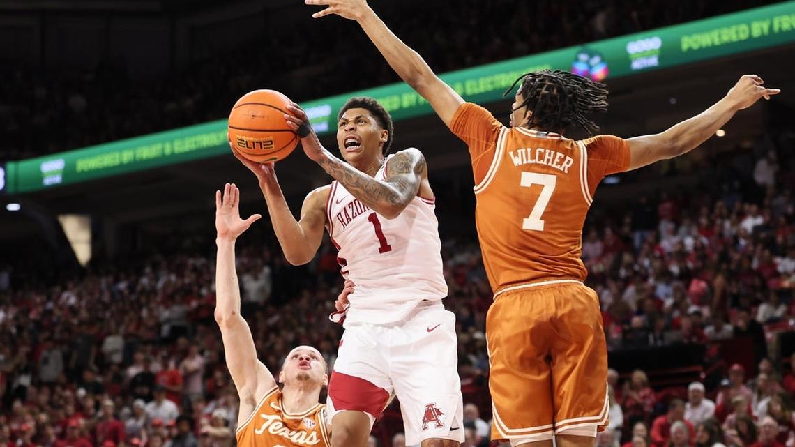 No. 20 Arkansas clinches SEC double bye, rolls past Texas 