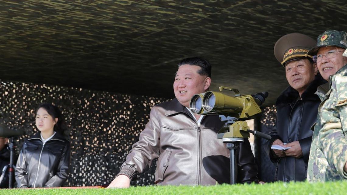 This image, released on March 20, shows North Korean leader Kim Jong Un and his daughter, Kim Ju Ae, observing a military exercise involving tanks, drones and other munitions. South Korean military officials said that the North test-launched multiple short-range ballistic missiles into the East Sea on Sunday morning.