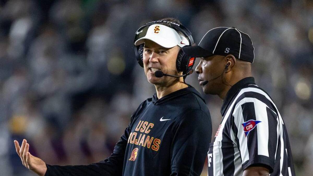  Oct 18, 2025; South Bend, Indiana, USA; Southern California Trojans head coach Lincoln Riley talks to an official during the first half against the Notre Dame Fighting Irish at Notre Dame Stadium. Mandatory Credit: Michael Caterina-Imagn Images | Michael Caterina-Imagn Images 