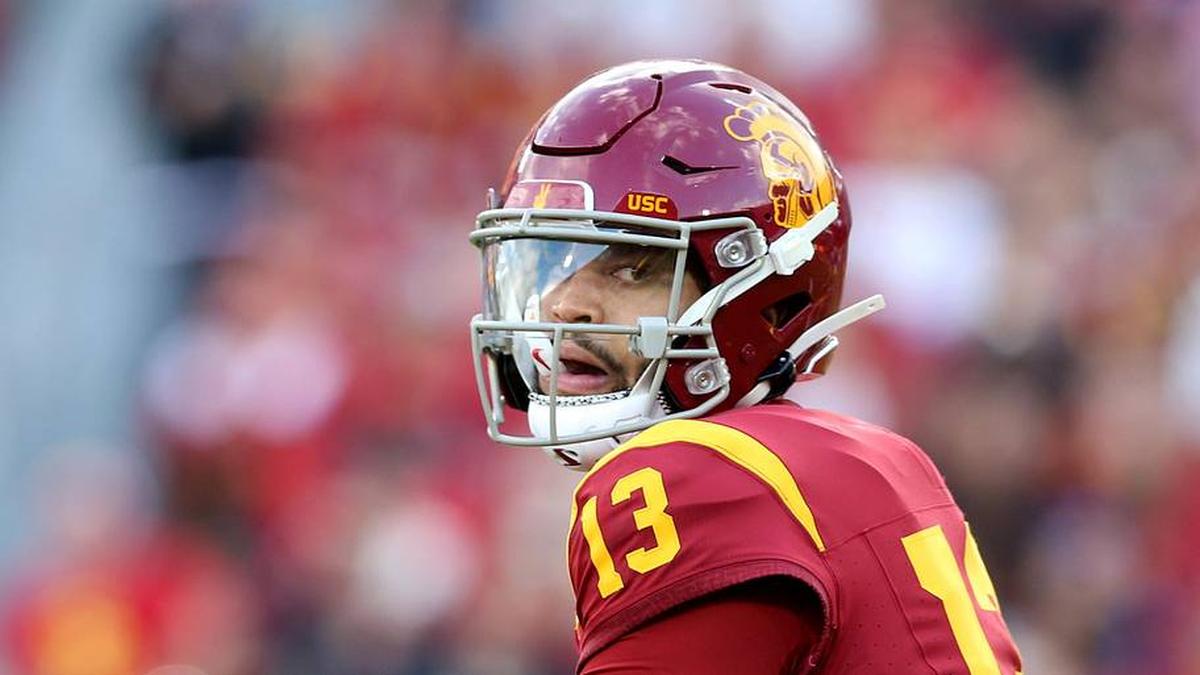 Nov 18, 2023; Los Angeles, California, USA; USC Trojans quarterback Caleb Williams (13) throws during the second quarter against the UCLA Bruins at United Airlines Field at Los Angeles Memorial Coliseum. Mandatory Credit: Jason Parkhurst-Imagn Images | Jason Parkhurst-Imagn Images 