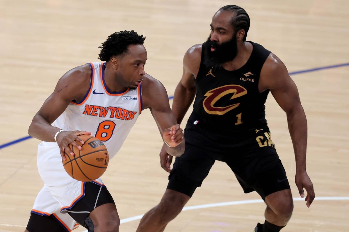  May 19, 2026; New York, New York, USA; New York Knicks forward OG Anunoby (8) drives to the basket against Cleveland Cavaliers guard James Harden (1) during the fourth quarter of game one of the eastern conference finals during the 2026 NBA playoffs at Madison Square Garden. Mandatory Credit: Brad Penner-Imagn Images 