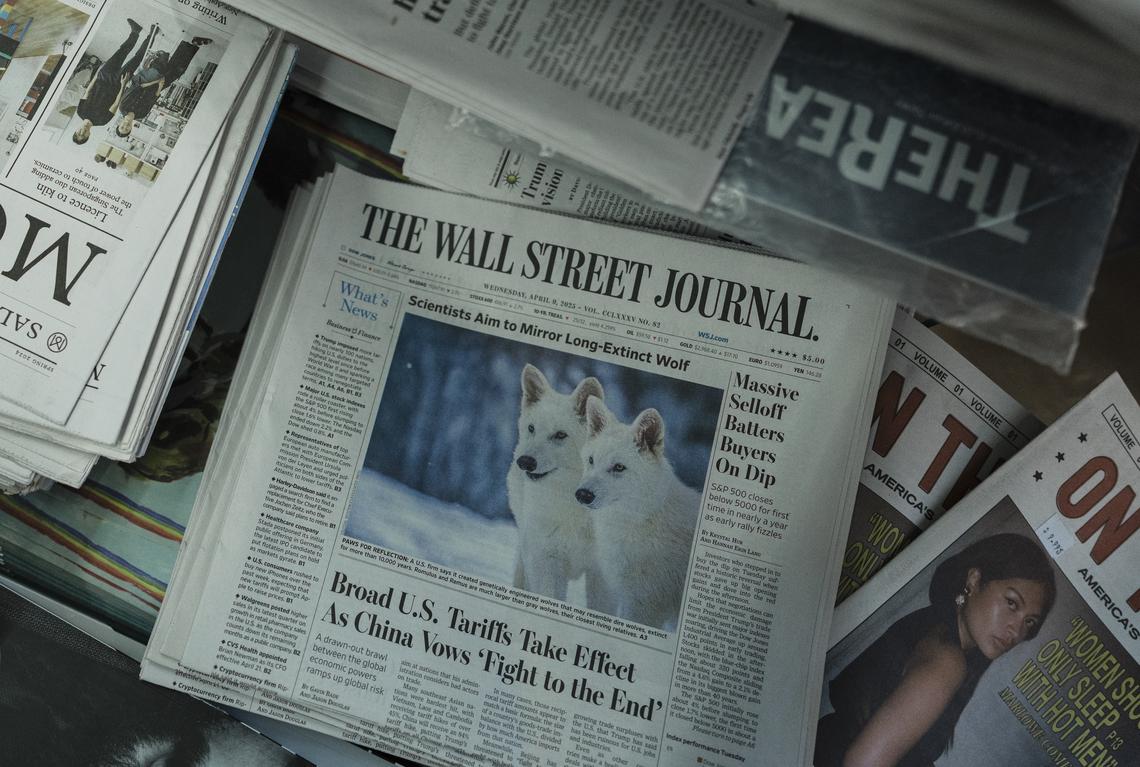 FILE -- Copies of The Wall Street Journal for sale in Manhattan, April 9, 2025. A federal judge on Monday, April 13, 2026, dismissed President Trump's $10 billion defamation lawsuit against the publisher of The Wall Street Journal over its report of his lewd birthday greeting to the sex offender Jeffrey Epstein. (Juan Arredondo/The New York Times)