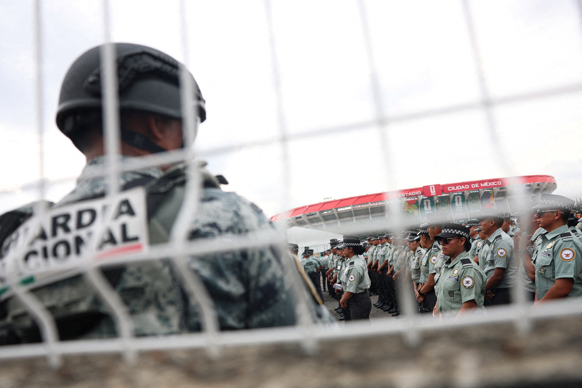 Soccer Football - FIFA World Cup 2026 - Group A - Mexico v South Africa Preview - Mexico City, Mexico - June 10, 2026 Members of the National Guard outside the Estadio Azteca ahead of the match REUTERS/Hannah Mckay