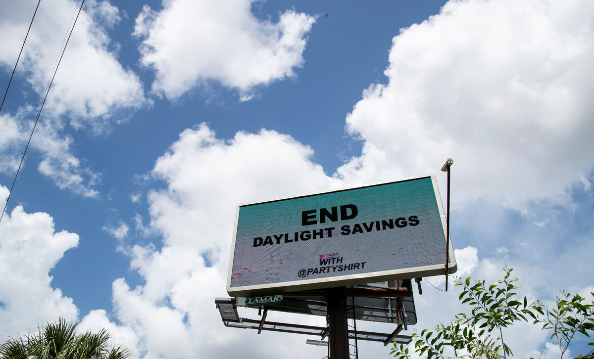 A billboard in Florida advocates for the end of Daylight Savings Time.
