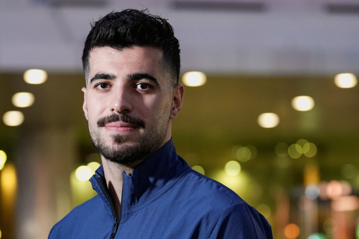 Iran player Saeid Ezzatollahi poses for a photo during an interview with Reuters after 15 Iranian soccer federation members denied visas to travel to the U.S. for the World Cup games, at a hotel in Tijuana, Mexico, June 11, 2026. REUTERS/Aimee Melo
