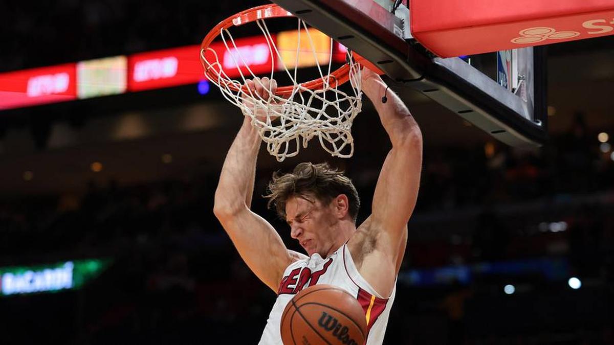  Apr 1, 2026; Miami, Florida, USA; Miami Heat guard Pelle Larsson (9) dunks against the Boston Celtics during the second quarter at Kaseya Center. Mandatory Credit: Sam Navarro-Imagn Images | Sam Navarro-Imagn Images 