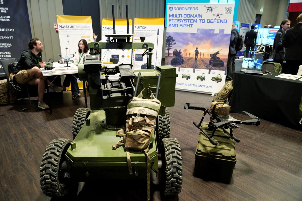 A Roboneers unmanned ground vehicle (UGV) and drone are displayed during the international Drone Summit in Riga, Latvia May 27, 2026. REUTERS/Ints Kalnins