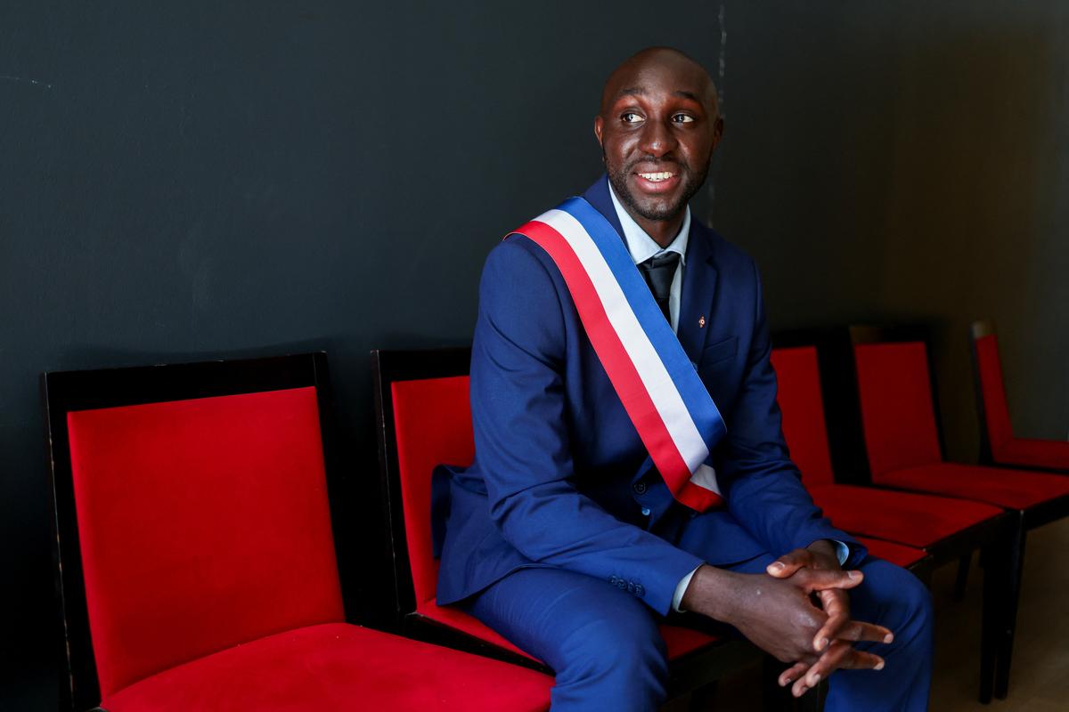 Bassi Konate, the new mayor of Sarcelles, poses for a portrait after attending a ceremony marking the 81st anniversary of Victory in Europe Day, which commemorates the end of the Second World War in Europe, in the Paris suburb of Sarcelles, France, May 8, 2026. REUTERS/Tom Nicholson