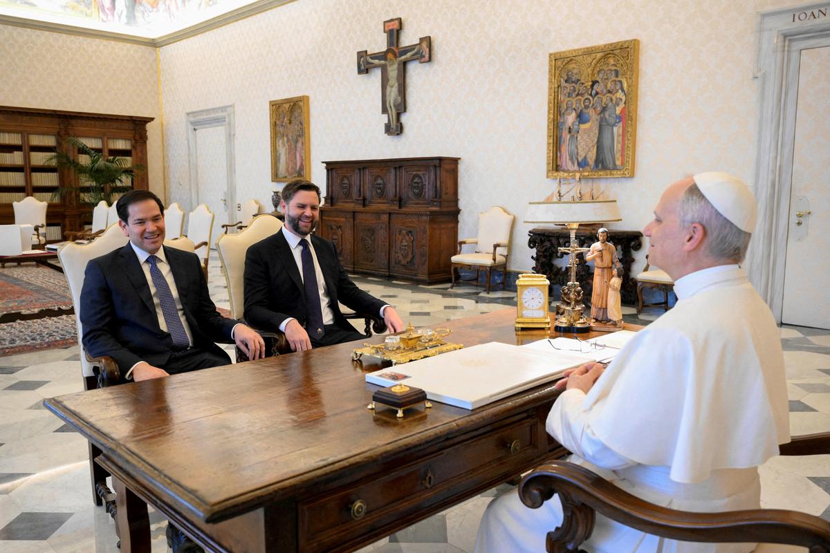 FILE PHOTO: Pope Leo XIV meets U.S Vice President JD Vance and U.S. Secretary of State Marco Rubio at the Vatican, May 19, 2025. Vatican Media/­Simone Risoluti/Handout via REUTERS    ATTENTION EDITORS - THIS IMAGE WAS PROVIDED BY A THIRD PARTY./File Photo