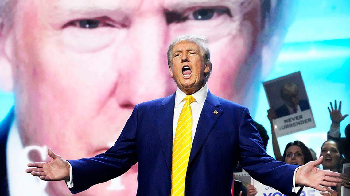 Former President Donald Trump makes an appearance at a town hall meeting hosted by the conservative group Turning Point Action at Dream City Church in Phoenix on Thursday.